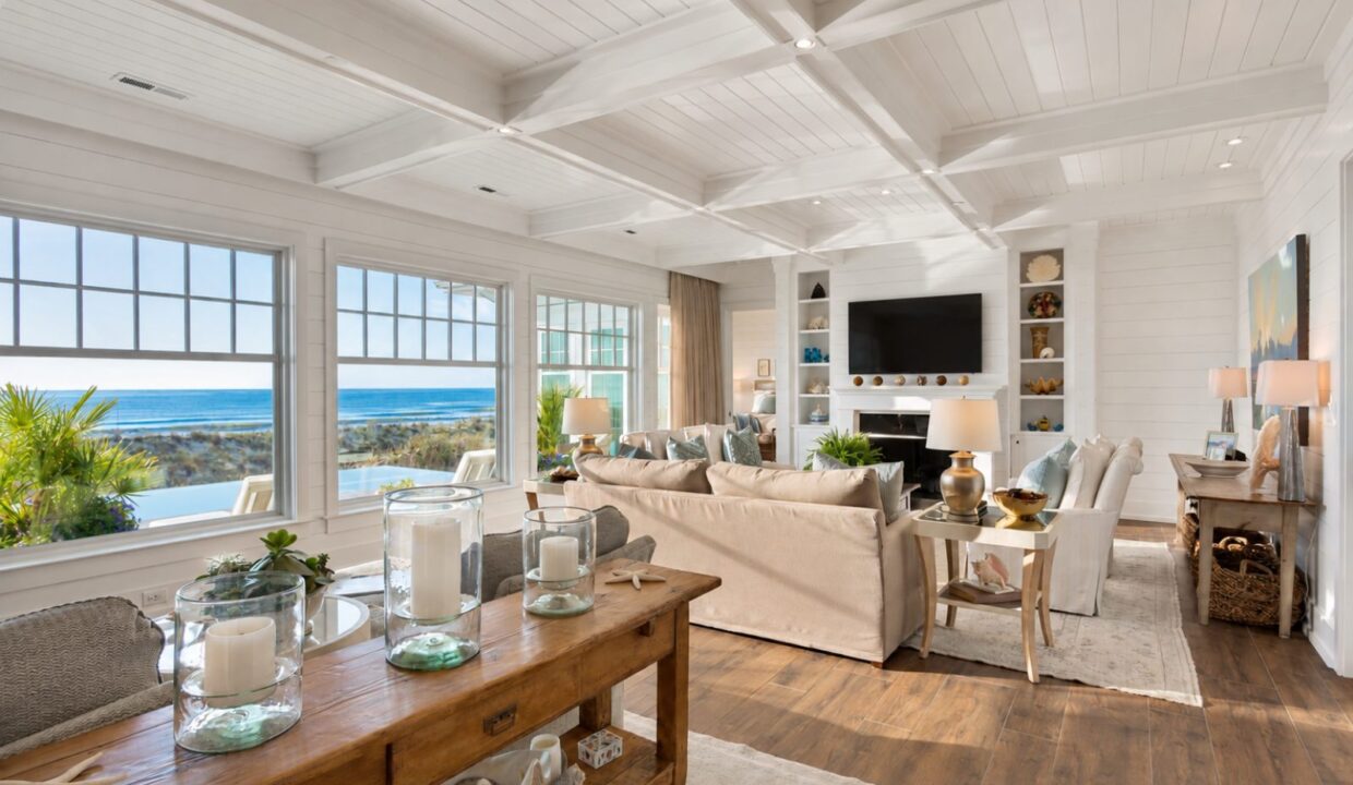 Living room with large windows and an ocean view